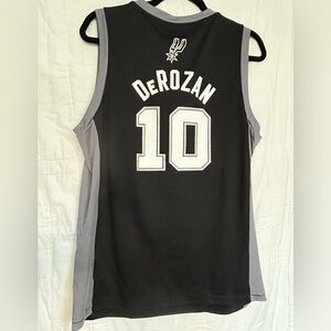 DeRozan Spurs basketball jersey. Adult medium. Black and silver, NWT